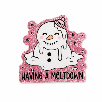 HAVING A MELTDOWN plastic add-on featuring a melting snowman on a pink glitter background, compatible with interchangeable badge reel bases and perfect for winter humor lovers.