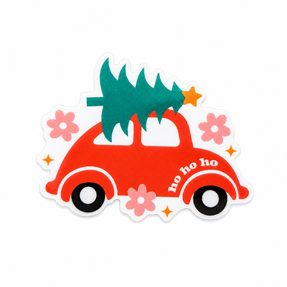 ho ho ho plastic add-on with red Christmas car, green tree, pink flowers, and stars, compatible with interchangeable badge reel bases.