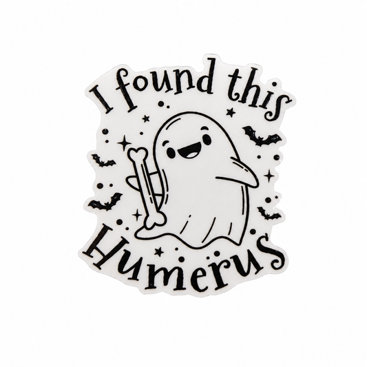 I Found This Humerus plastic add-on featuring a smiling ghost holding a humerus bone with bats, compatible with interchangeable badge reel bases for orthopedic nurses and healthcare workers.