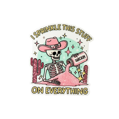 Funny skeleton cowgirl sticker with “I Sprinkle This Stuff on Everything” sarcasm quote, pink western spooky aesthetic design.