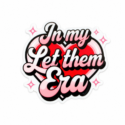 In My Let Them Era plastic add-on featuring pink script lettering and a heart design, compatible with interchangeable badge reel bases and perfect as a cute nurse badge accessory and healthcare worker accessory
