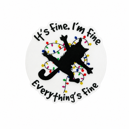 Plastic add-on featuring the phrase It's Fine. I'm Fine Everything's Fine with a black cat tangled in Christmas lights, compatible with interchangeable badge reel bases.