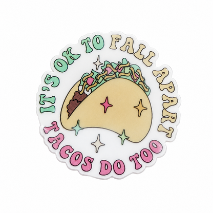 T'S OK TO FALL APART TACOS DO TOO plastic add-on with smiling taco design, funny taco lover accessory compatible with interchangeable badge reel bases.