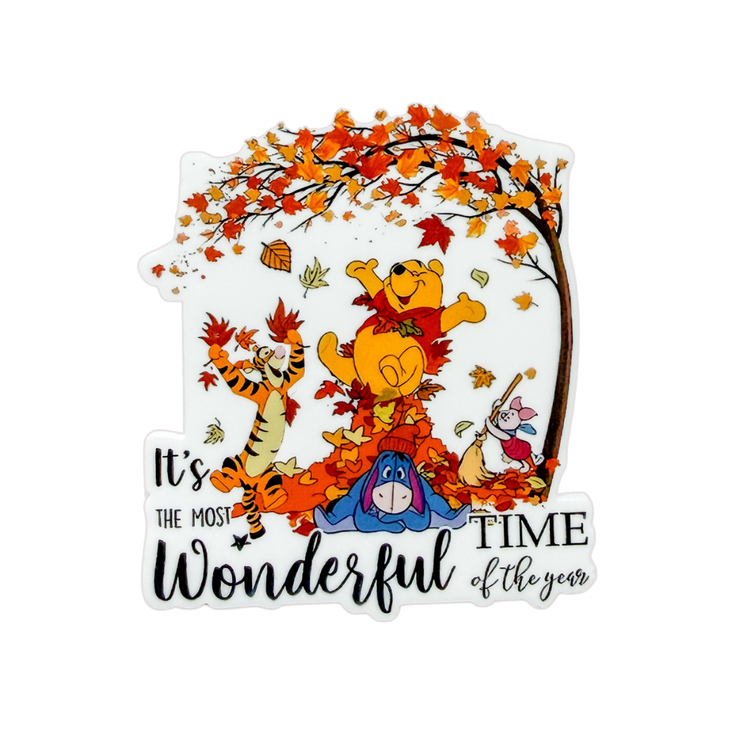 It's The Most Wonderful Time Of The Year plastic add-on featuring a bear and friends playing in colorful autumn leaves with pumpkins, compatible with interchangeable badge reel bases.