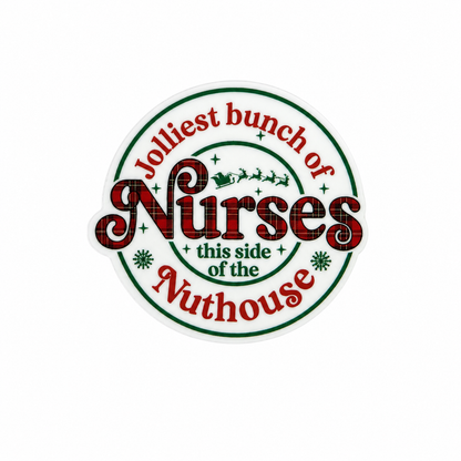 Plastic add-on featuring the phrase Jolliest bunch of Nurses this side of the Nuthouse in festive Christmas lettering, compatible with interchangeable badge reel bases and perfect for nurses and healthcare workers.