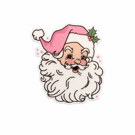 Plastic add-on featuring a smiling Santa face with a pink Santa hat and holly accents, compatible with interchangeable badge reel bases and perfect for Christmas lovers.