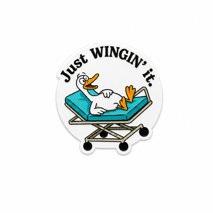 Just Wingin’ It goose plastic add-on with funny stretcher design, made as a cute emergency medicine work accessory compatible with interchangeable badge reel bases