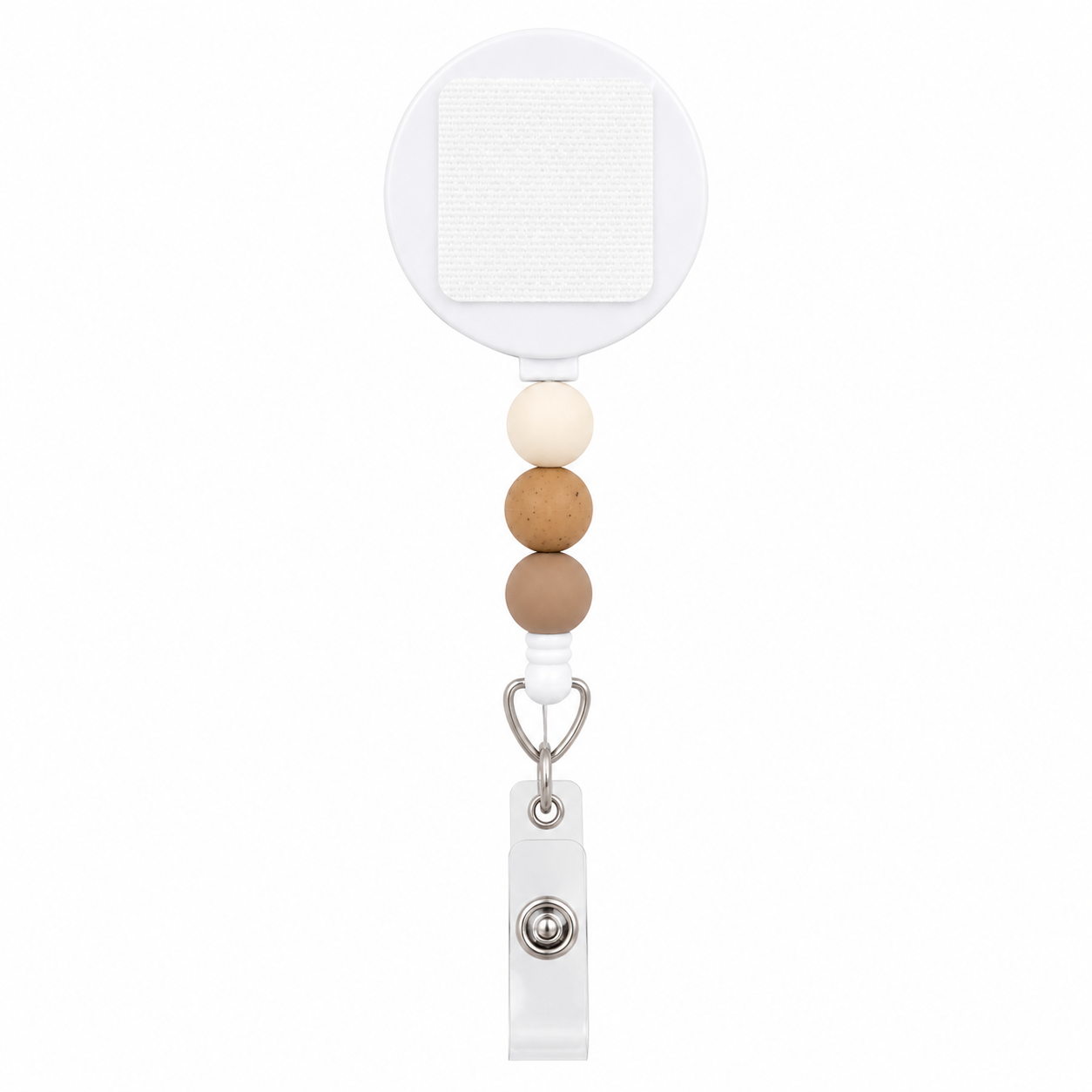Latte badge reel featuring ivory, speckled tan, and taupe silicone beads with an interchangeable topper area on a retractable badge reel.