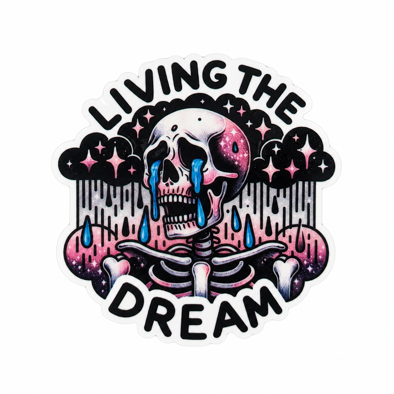 Living The Dream plastic add-on featuring a melting skeleton with stars and clouds, compatible with interchangeable badge reel bases, gothic humor accessory