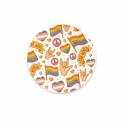 Love Wins hard board add-on featuring rainbow pride flags, trans pride hearts, peace signs, and inclusive pride-themed artwork, compatible with interchangeable badge reel bases.