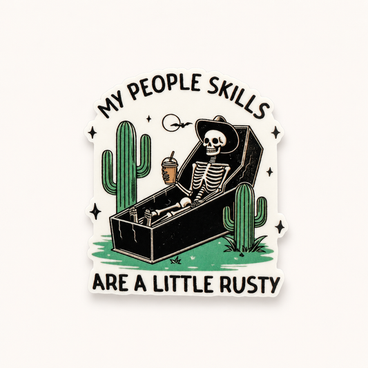 Funny skeleton cowboy sticker with “My People Skills Are a Little Rusty” quote, western desert design with cactus and retro dark humor aesthetic.
