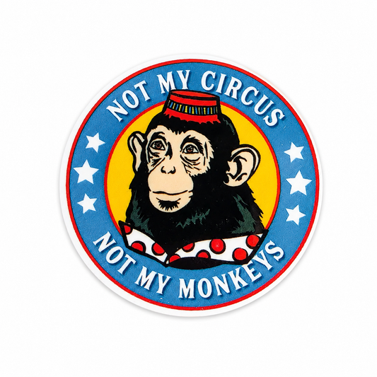 Plastic add-on featuring a circus monkey in clown attire with the text "NOT MY CIRCUS NOT MY MONKEYS," compatible with interchangeable badge reel bases, funny work accessory and coworker gift.
