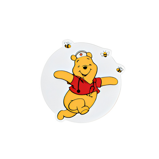 Cute nurse bear plastic add-on featuring a smiling bear wearing red scrubs, a nurse cap, and stethoscope with bees, compatible with interchangeable badge reel bases and perfect as a nurse badge accessory