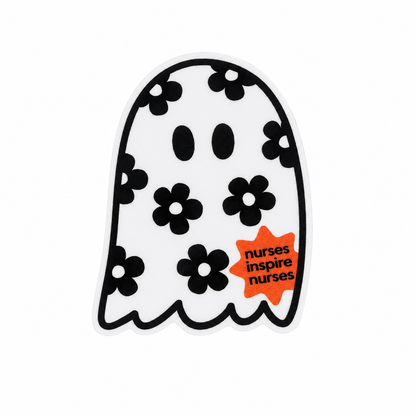nurses inspire nurses plastic add-on with floral ghost design, black flowers, and orange accent, compatible with interchangeable badge reel bases.