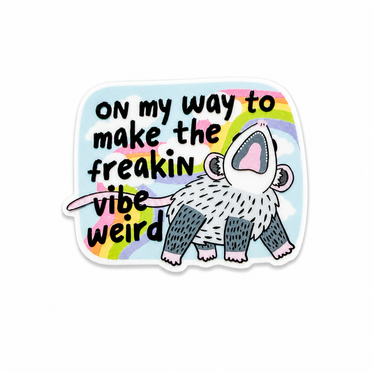 On my way to make the freakin vibe weird plastic add-on featuring a funny possum with rainbow background, compatible with interchangeable badge reel bases.