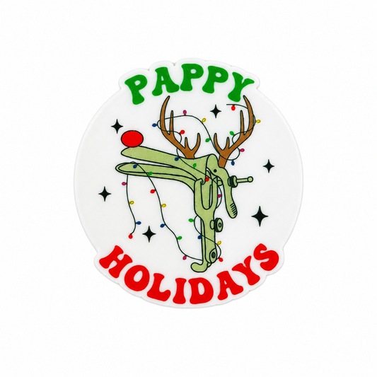Plastic add-on featuring the phrase PAPPY HOLIDAYS with a festive cactus decorated with Christmas lights and antlers, compatible with interchangeable badge reel bases.