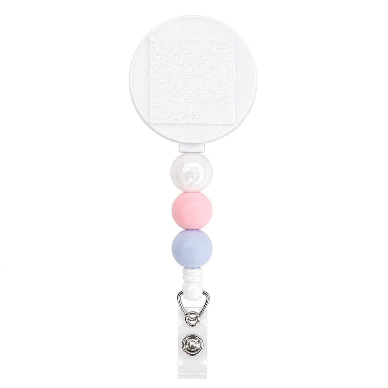 Pastel Trio badge reel featuring pearl white, blush pink, and pastel blue silicone beads with an interchangeable topper area on a retractable badge reel.