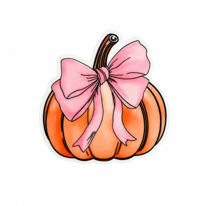 Plastic add-on featuring an orange pumpkin with a large pink bow, compatible with interchangeable badge reel bases and perfect for fall and pumpkin season accessories.
