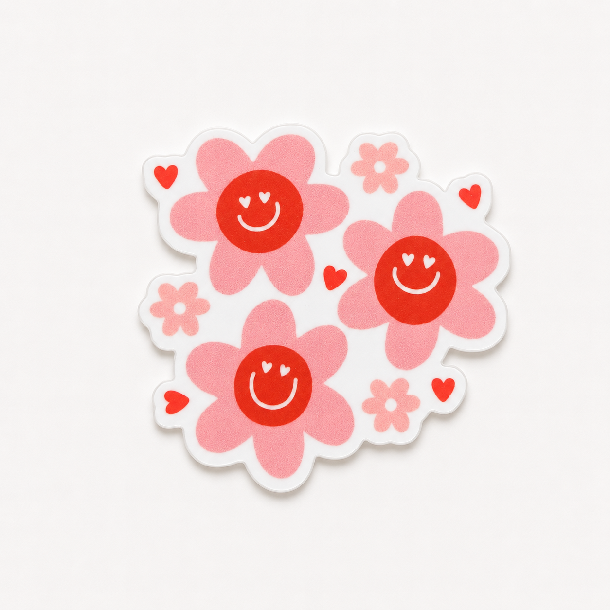 Pink smiley flower plastic add-on for compatible interchangeable badge reel bases with cute floral design