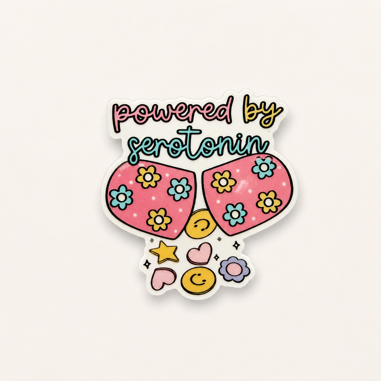 Cute “Powered by Serotonin” sticker with pastel floral sunglasses, smiley faces, and colorful retro kawaii aesthetic on a white background.