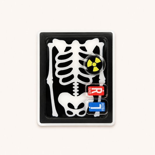 Radiology skeleton plastic add-on for compatible interchangeable badge reel bases designed for healthcare workers and X-ray techs