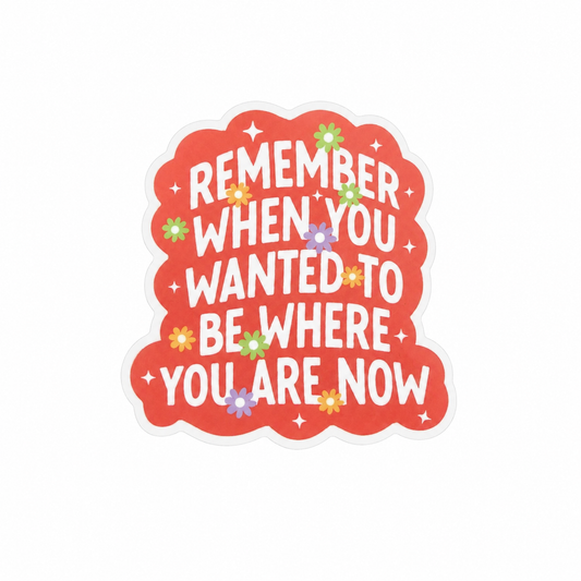 REMEMBER WHEN YOU WANTED TO BE WHERE YOU ARE NOW plastic add-on with colorful flowers and inspirational quote, compatible with interchangeable badge reel bases.