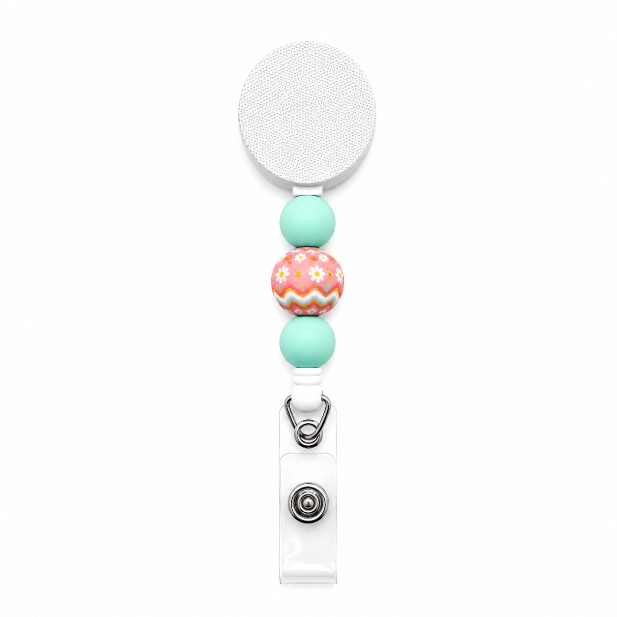Retro Bloom interchangeable badge reel featuring mint green silicone beads and a colorful retro floral focal bead with daisy and rainbow wave patterns.
