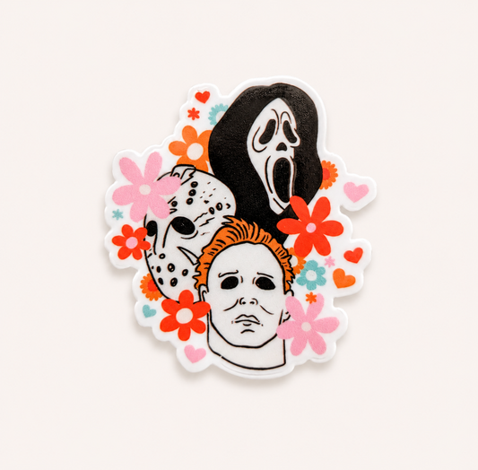 Retro horror floral plastic add-on for compatible interchangeable badge reel bases with spooky slasher character design
