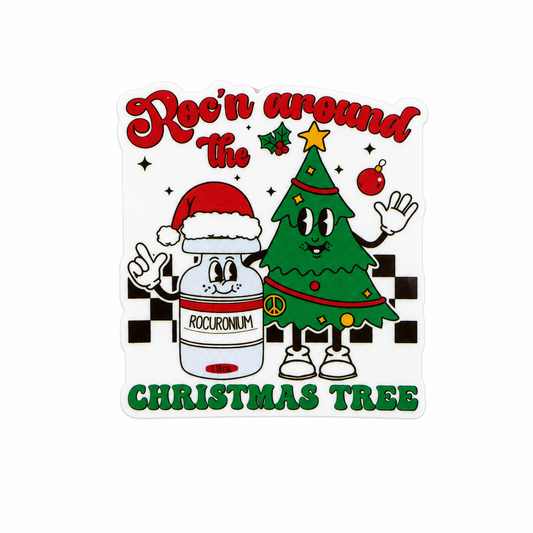 Plastic add-on featuring a smiling Christmas tree and medication vial with Santa hat and the phrase Rockin around the CHRISTMAS TREE, compatible with interchangeable badge reel bases and perfect for respiratory therapists.