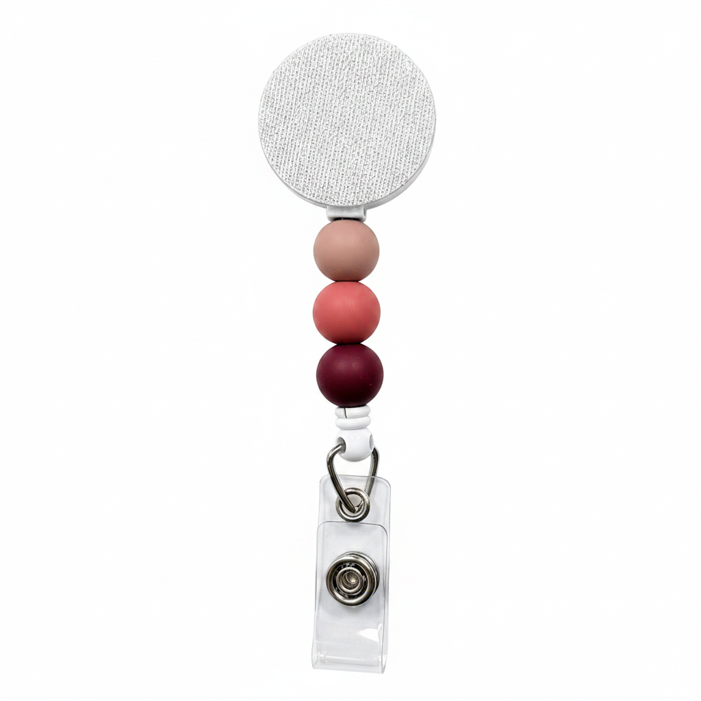 Rosewood Latte badge reel featuring latte beige, dusty rose, and deep rosewood decorative beads with a retractable badge reel design and secure badge holder attachment.