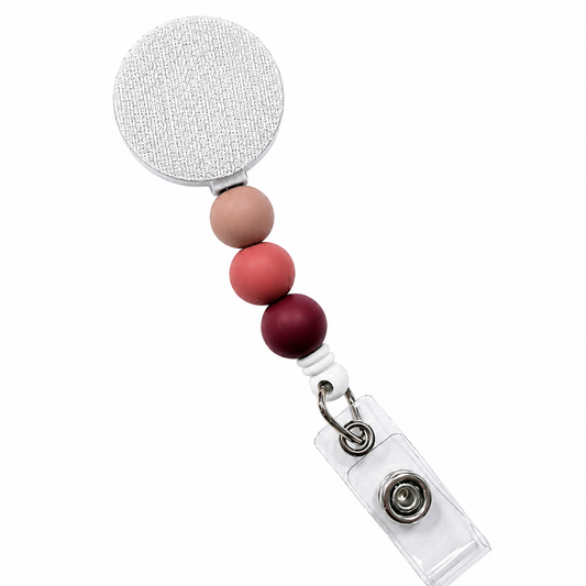 Rosewood Latte badge reel featuring latte beige, dusty rose, and deep rosewood decorative beads with a retractable badge reel design and secure badge holder attachment.