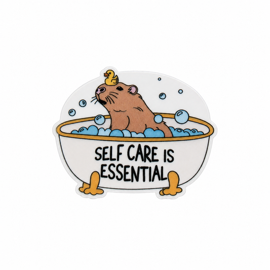 SELF CARE IS ESSENTIAL plastic add-on featuring a relaxing capybara in a bubble bath with a rubber duck, compatible with interchangeable badge reel bases and perfect for self care and wellness enthusiasts