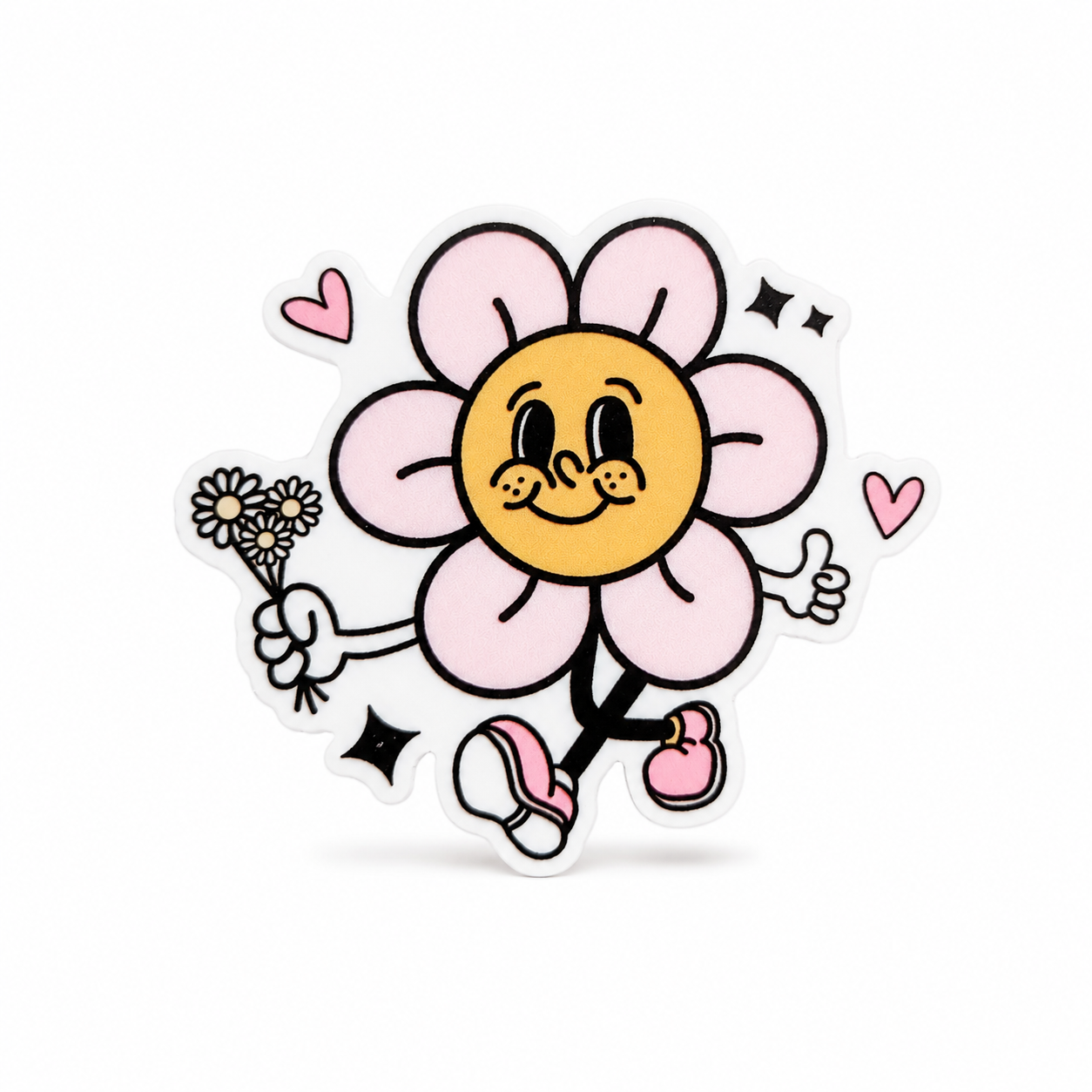 Cute flower character plastic add-on with pink petals, smiling orange center, hearts, sneakers, and daisies, compatible with interchangeable badge reel bases