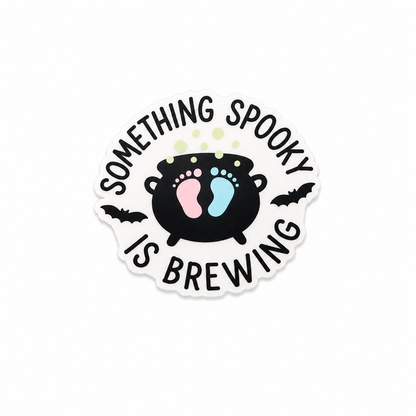 Something Spooky Is Brewing plastic add-on with pastel baby footprints and cauldron Halloween design compatible with interchangeable badge reel bases