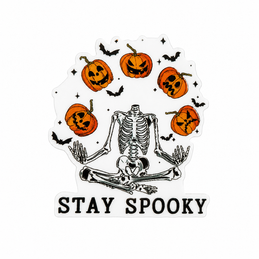 STAY SPOOKY plastic add-on with sitting skeleton, jack-o’-lantern pumpkins, bats, and stars, compatible with interchangeable badge reel bases.