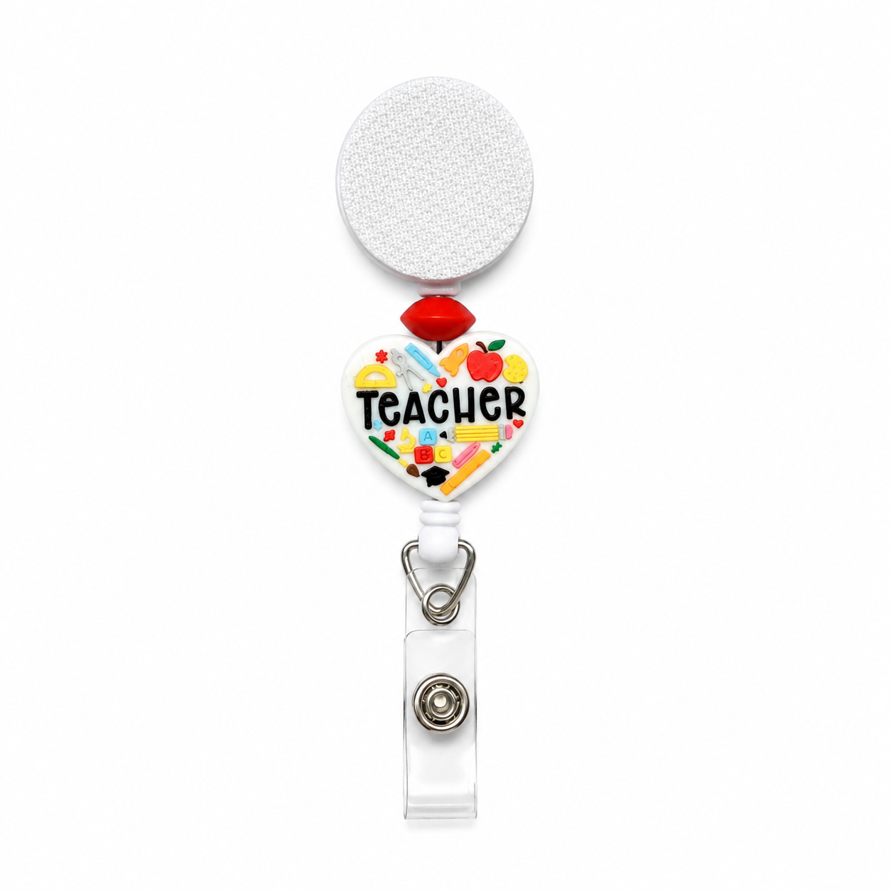Teacher heart badge reel featuring colorful classroom icons, apple, books, pencils, ABC blocks, and a retractable badge holder for teachers and educators.