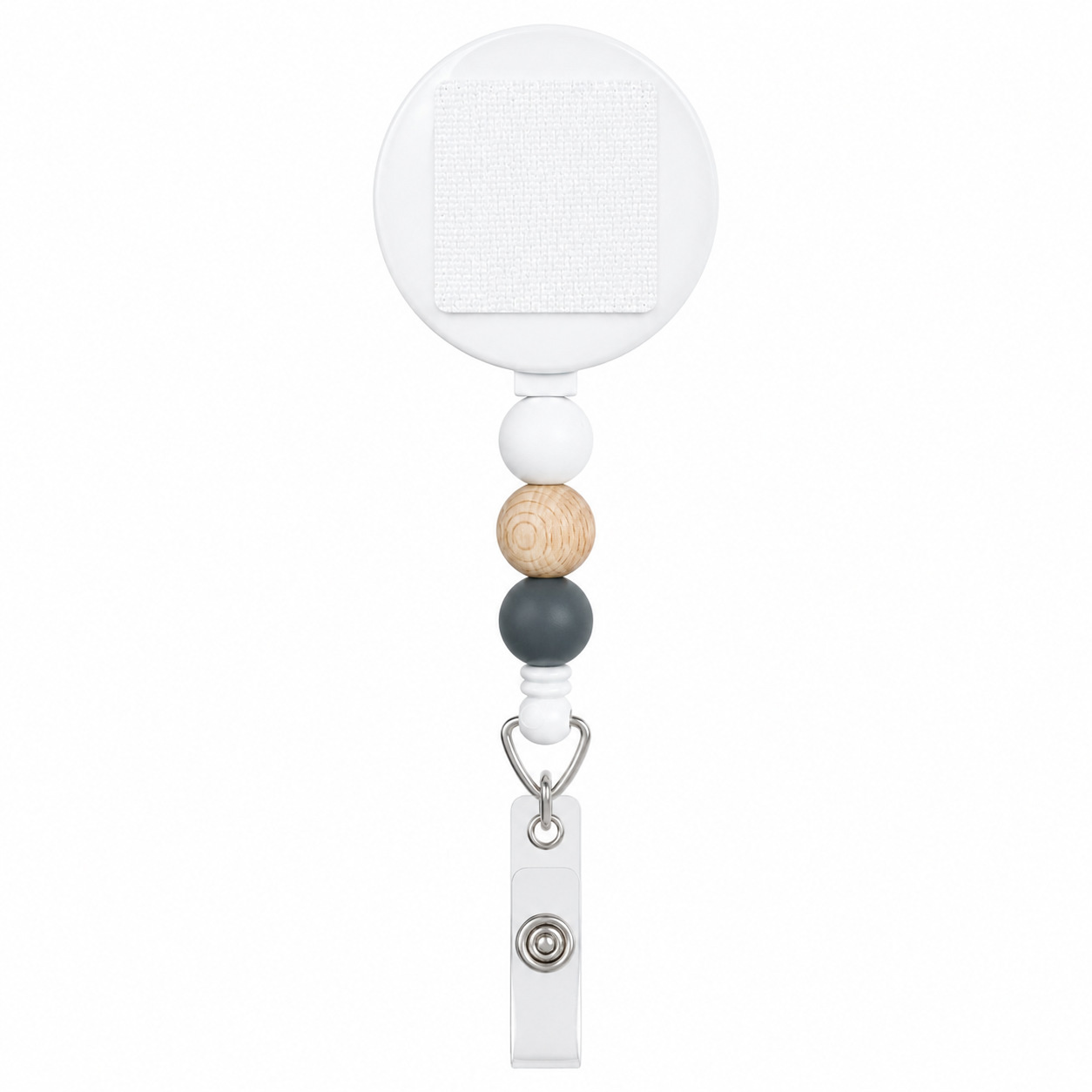 Modern Timber badge reel featuring white, natural wood, and charcoal silicone beads with an interchangeable topper area on a retractable badge reel.