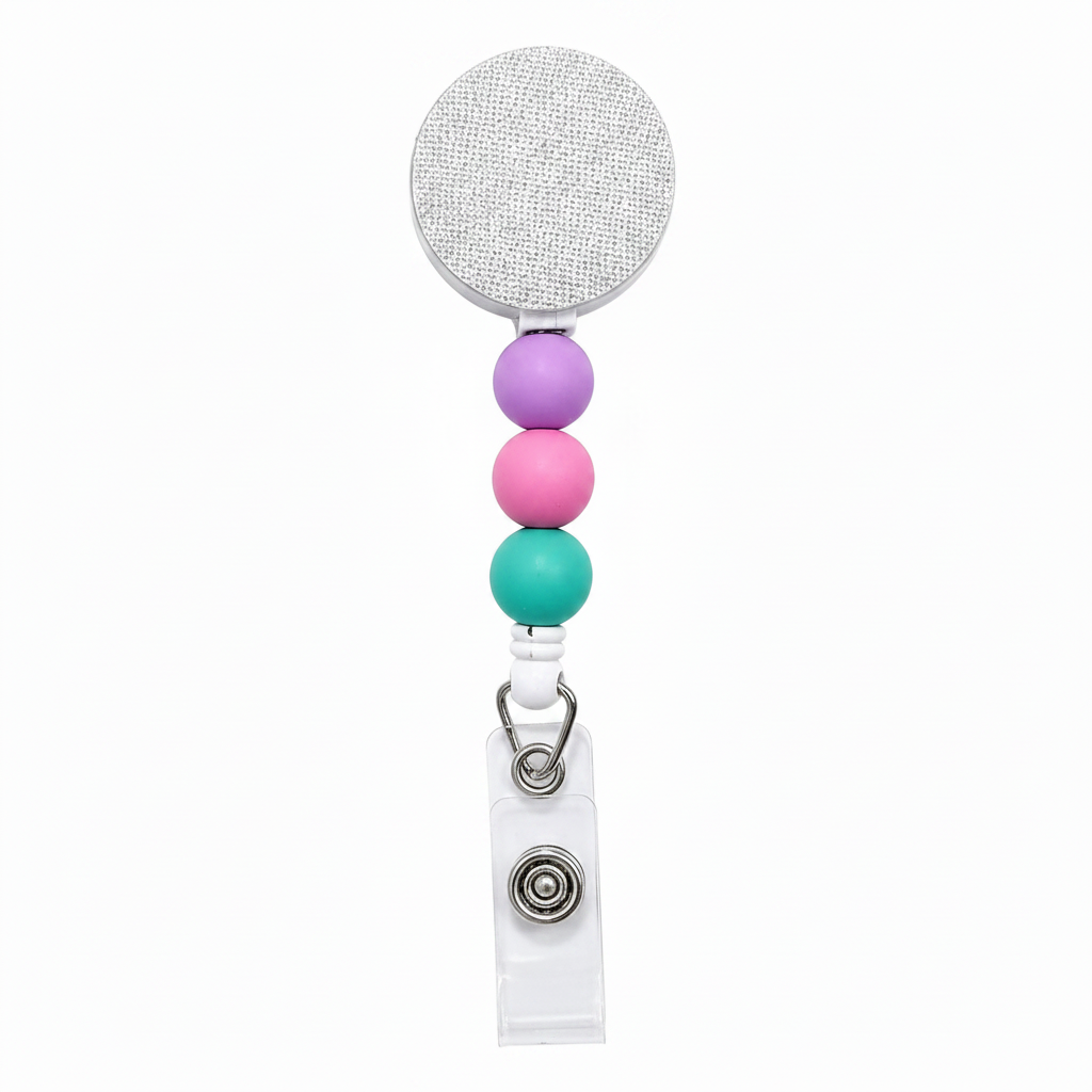 Tropical Taffy badge reel featuring aqua blue, periwinkle blue, and pearl white decorative beads with a retractable badge reel design and secure badge holder attachment.