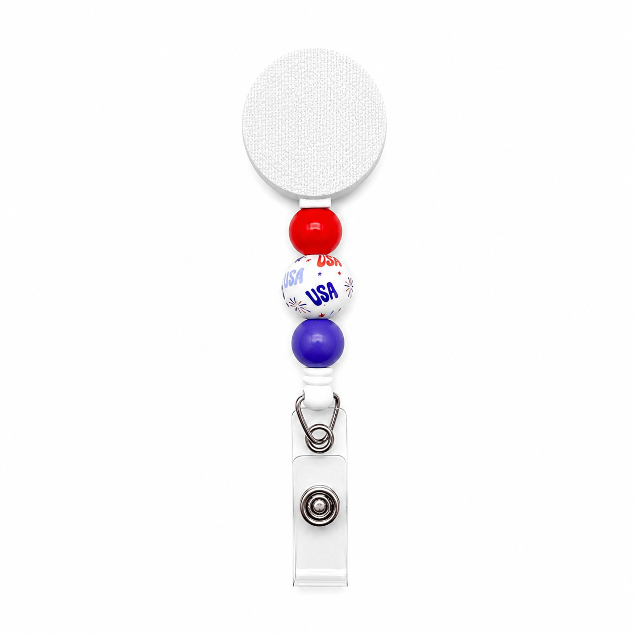 USA patriotic badge reel featuring a red, white, and blue beaded design with a USA printed focal bead on a white retractable interchangeable badge reel.