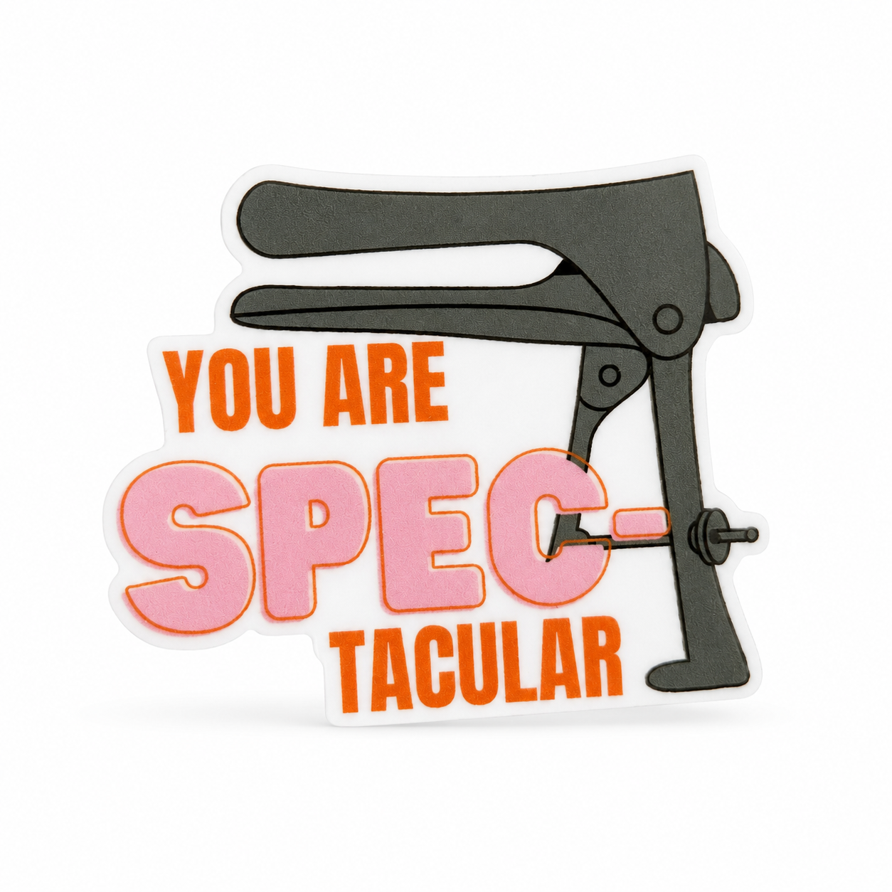 YOU ARE SPEC-TACULAR plastic add-on with a speculum illustration and pink-orange lettering, compatible with interchangeable badge reel bases for OB-GYN nurses.